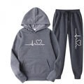 Flat lay of dark grey hoodie set featuring white heartbeat graphic and kangaroo pocket - Dark Gray