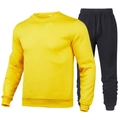 Casual two-piece set featuring bright yellow crewneck sweatshirt and black joggers - Yellow