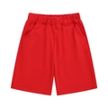 Close-up of red cotton kids shorts with elastic waistband and functional side pockets - 100cm / Red
