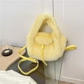 Fuzzy yellow plush handbag for women with thin leather strap and soft faux fur finish - Yellow
