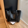 Retro black tote bag in glossy faux leather with metal logo and thin shoulder straps - Black