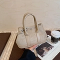 Sac seau élégant en daim beige et cuir lisse avec poignées et bandoulière réglable - Gris Beige