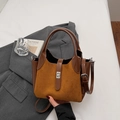 Brown matte suede and leather bucket bag with top handle and metal lock detail - Brown No Pendant