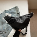 Minimalist black nylon crescent crossbody bag with adjustable strap and zipper closure - Black Small
