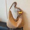 Brown suede dumpling bag with woven rope strap and dachshund plush charm - Khaki