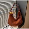 Caramel suede crescent tote bag with a colorful woven strap and dachshund doll charm - Brown