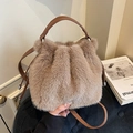 Faux fur bucket bag in light coffee with leather handles and crossbody strap - Brown