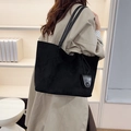 Black suede tote bag with slim shoulder straps and matching small pouch accessory - Tote Bag And Pouch / Black