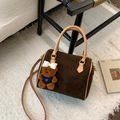 Brown frosted Boston handbag with tan leather handles and a plush bear charm on side - Large Coffee With Charm