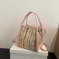 Colorful striped woven bucket bag with pink leather handles and shoulder strap - Pink