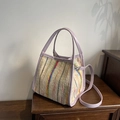 Colorful woven stripe bucket bag with lavender leather trim and adjustable strap - Purple