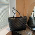 Classic black quilted leather tote bag with gold rivets and large capacity for daily use - Black
