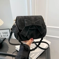 Retro black suede shoulder bag with bow detail and braided handle for women - Black