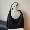 Large black suede hobo shoulder bag with adjustable strap and silver buckle detail - Black