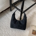 Minimalistische schwarze Hobo-Tasche aus Wildleder mit matter Textur und Reißverschluss - Klein Schwarz