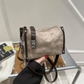 Beige suede crossbody Boston bag with quilted stitching and dark brown leather trim - Brown Gray