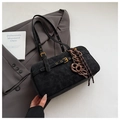 Black suede underarm bag with vintage metal buckle and decorative charms on grey blazer - With Pendant / Black