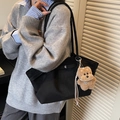 Black vintage bucket tote bag with silver buckle and cute brown teddy bear charm - Black with Pendant