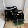 Macro detail of quilted black suede and smooth leather on crossbody tote bags with chain straps - Large / Black