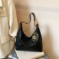 Black leather hobo tote bag with a golden chain strap and leopard print charm accessory - With Pendant / Black