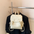 Creamy white chic backpack with pebbled texture and parallel buckles in a minimalist style - Rice White (No Pendant)