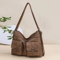 Vintage brown leather tote bag with dual front pockets and adjustable shoulder strap - Brown