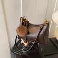 Deep brown leather dumpling bag with KOSKA & BAGS logo and brown plush charm - Coffee (With Pendant)