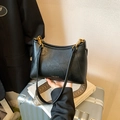 Black vegan leather dumpling bag with woven strap and gold hardware for women - Black (Without Charm)