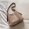 Minimalist brown suede tote bag with leather strap on soft white linen background - Khaki No Pendant