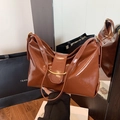 Caramel brown glossy faux leather tote bag with elegant golden circular metal buckle - Brown