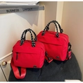 Detailed view of red nylon crossbody bags with polka dot rope handles and metal logo - Wine Red Large