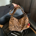 Chic leopard print tote bag with plush fur ball charm and wide shoulder strap - With Charm / Leopard Brown