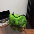 Neon green faux fur shoulder bag with black strap and fuzzy ball detail for women - Green
