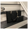 Detailed view of leopard print tote bag with faux fur trim and gold chain strap - One Size / Black