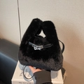 Chic black faux fur handbag with silver twist lock and slim leather shoulder strap - Black
