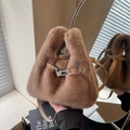 Brown faux fur bucket bag with dual handles and silver twist lock in autumn style - Khaki