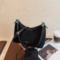 Borsa a secchiello retrò in camoscio nero con logo dorato e doppia tracolla in pelle - Nero