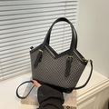 Chic houndstooth pattern tote bag with black leather handles and golden hardware detail - Black