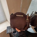 Moednt dark brown suede bucket bag with cut-out handle and slim crossbody strap - Brown