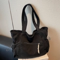 Grande borsa tote in velluto a coste nero con tasche multiple e spalline larghe - Nero