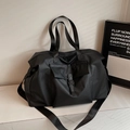 Black large capacity travel bag in waterproof nylon with buckle pocket and shoulder strap - Black