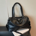Large black tote travel bag with adjustable strap and polished silver hardware - Black