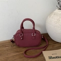 Chic burgundy Boston handbag with dual top handles and adjustable strap for women - No Pendant / Red
