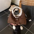 Dark brown suede crossbody bag with white faux fur trim and decorative plush pom-poms - Coffee