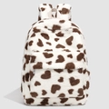 Detailed close-up of soft faux fur backpack featuring brown heart-shaped cow print - White and Brown