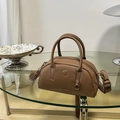 Brown lychee leather Boston bag with contrast stitching and adjustable crossbody strap - Dark Milk Tea