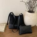 Minimalist black bucket bag set in mixed suede and smooth leather for daily commute - Black