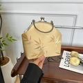 Golden silk handbag with bamboo leaf embroidery and retro metal chain handle - Yellow
