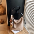 Khaki suede hobo tote bag with wide leather strap and decorative plush charms - With Charm / Beige Grey