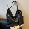 Black leather tote bag with white contrast stitching and matching small zipper pouch - Black